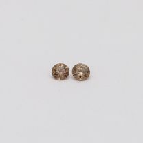 0.08 Total carat pair of champagne diamonds